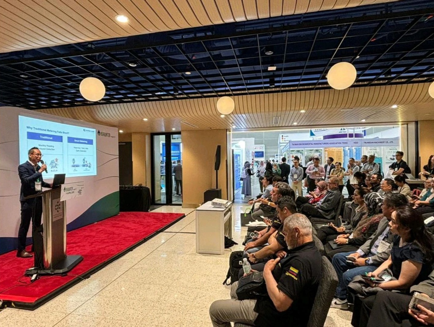 Vincent Wong presenting on stage at AsiaWater 2026